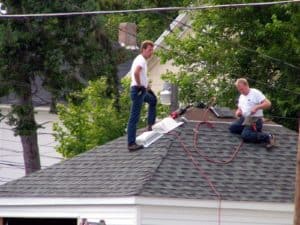 Residential Roofing Services Shoreview MN - Two Men Talking on a Roof