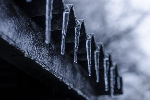 Icicles hanging from a roof
