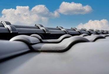 What Are the 4 Main Types of Roof Vents for Attic Ventilation? - A Metal Roof with Ridge Vent
