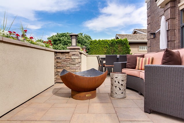 Affordable Deck and Patio Services St Paul MN - A Beige Stone Patio with Brown Furniture