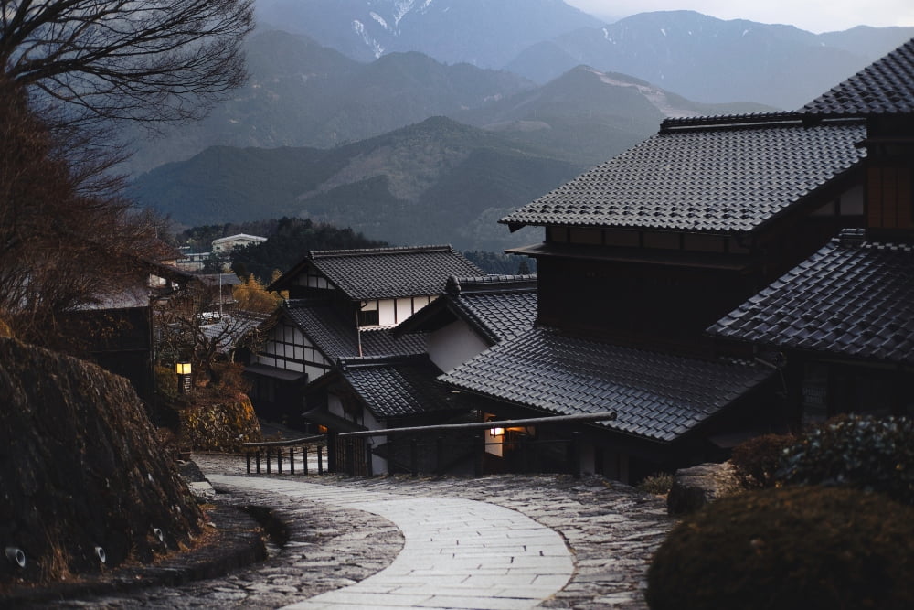 White houses with grey roofs.