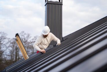 A man doing roofing for historical homes trying to balance modernization and preservation