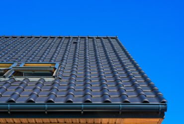 a clean roof representing the role of gutters and drainage systems